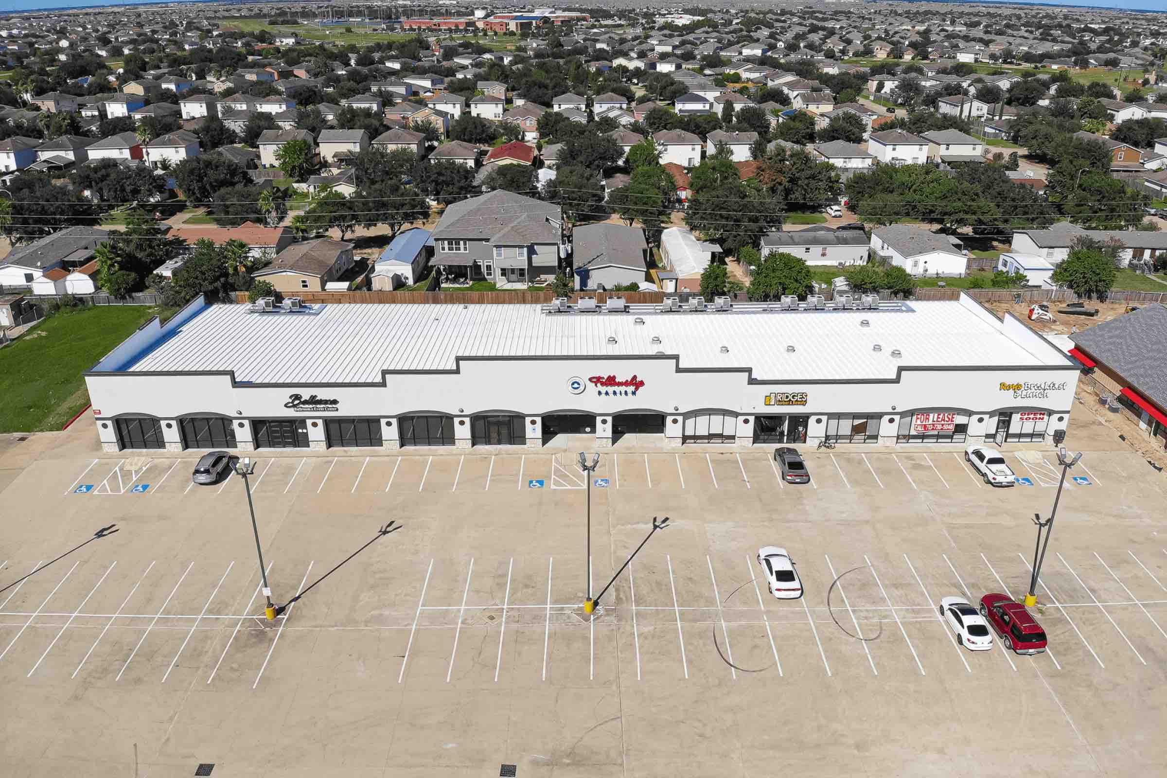 Aerial view of Cy Spring Plaza and its parking lot